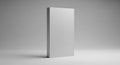 Plain white rectangular object standing against a grey background Royalty Free Stock Photo