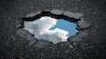 A puddle reflecting the sky and clouds. Royalty Free Stock Photo