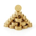 The image shows a pyramid composed of numerous golden coins, meticulously stacked to create a visually appealing structure. The Royalty Free Stock Photo