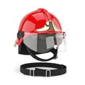 Red fire helmet with protective face shield and chin strap for emergency use Royalty Free Stock Photo
