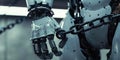The image shows a robot restrained by chains, representing limitations in AI control and technology AIG62 Royalty Free Stock Photo