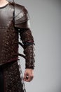 Brown Leather Arm Armor with Studded Design. Royalty Free Stock Photo