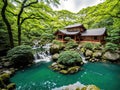 A Japanese garden with a small stream running through it. Royalty Free Stock Photo