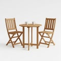 Compact wooden bistro set with two folding chairs and a round table Royalty Free Stock Photo