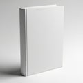 A plain white rectangular box standing upright on a gray surface Royalty Free Stock Photo