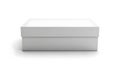 Minimalist white rectangular box with a lid placed on a plain background Royalty Free Stock Photo