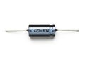 Blue cylindrical capacitor rated at 470 microfarads and 63 volts Royalty Free Stock Photo