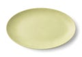A sleek, oval-shaped ceramic dinner plate displayed against a plain background Royalty Free Stock Photo