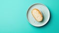 A slice of bread on a light blue plate. Royalty Free Stock Photo