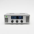 Compact digital power supply unit with adjustable voltage and current controls Royalty Free Stock Photo