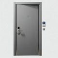 Modern grey steel door with electronic keypad and handle lock system Royalty Free Stock Photo