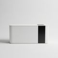 Minimalist rectangular object with contrasting black and white accents on a neutral background Royalty Free Stock Photo