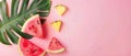 The image shows sliced watermelon on pastel pink background with a pineapple leaf. This is a creative idea with a Royalty Free Stock Photo