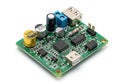 Compact electronic development board with capacitors and microcontroller components Royalty Free Stock Photo