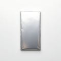 Sleek silver pouch standing upright against a plain background Royalty Free Stock Photo