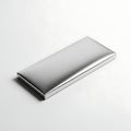 Sleek modern metallic rectangular object placed on a neutral background Royalty Free Stock Photo