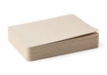 Stack of beige corrugated cardboard sheets with a single sheet on top Royalty Free Stock Photo