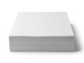 A neatly stacked pile of blank white paper on a white background Royalty Free Stock Photo