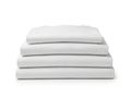 A neatly folded stack of white cotton bed sheets on a white background isolated on white background Royalty Free Stock Photo