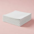 A stack of white perforated paper sheets on a pink background Royalty Free Stock Photo