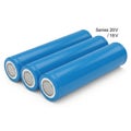 Three cylindrical lithium-ion batteries labeled as 20v and 18v series Royalty Free Stock Photo