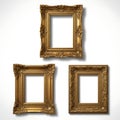 Three ornate gold picture frames displayed against a plain background Royalty Free Stock Photo