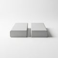 Two gray rectangular objects placed side by side on a white background Royalty Free Stock Photo