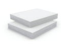 Stacked white rectangular foam or cushion blocks against a plain background Royalty Free Stock Photo
