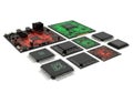 Assorted electronic circuit boards and integrated circuit chips displayed together Royalty Free Stock Photo