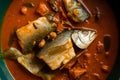 Delicious Fish Curry in Rich Red Sauce Royalty Free Stock Photo