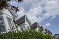 Streets in London, England - white houses and blue sky. Royalty Free Stock Photo