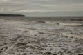 Whitby, Yorkshire - choppy waters of the sea and dark skies.