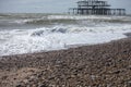 West Pier, Brighton, England - the waves and the pebbles. Royalty Free Stock Photo