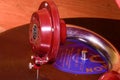 Image shows vintage gramophone famous Czech brand Supraphone. The red wind-up gramophone and vinyl record brand Ultraphon.