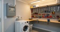 laundry room and workshop with fuse box and tools Royalty Free Stock Photo