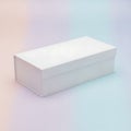 A white rectangular object with holes on a pastel background Royalty Free Stock Photo