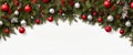 Wide arch shaped Christmas border isolated on a white background, composed of fir branches and ornaments in red and silver color Royalty Free Stock Photo