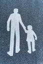 Image of Sign or symbol for pedestrians at the tiled road