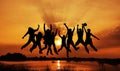 Image of silhouettes group jumping