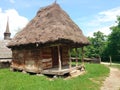 Image of simple cottage with straw roof