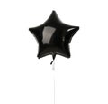 Image of single big black star latex balloon for birthday or wedding party Royalty Free Stock Photo