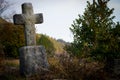 Old Weathered and Forgotten Stone Cross Royalty Free Stock Photo