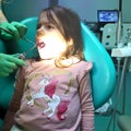 Image of a small girl at the dentist