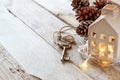 Image of small miniature house and old key over rustic wooden table Royalty Free Stock Photo