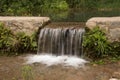 Small waterfall next to the river