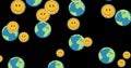 Image of smiling emoticons floating over globes on black background