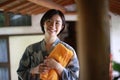 A smiling woman in a yukata