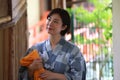 A smiling woman in a yukata