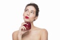 Image of smiling young girl with a red apple Royalty Free Stock Photo