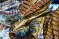 Smoked carp on a shelf in the store.